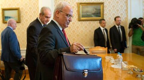 Palestinian negotiator Saeb Erekat, center, arrives for his and Russian Foreign Minister Sergey Lavrov talks in Moscow, Russia. Source; AP photo